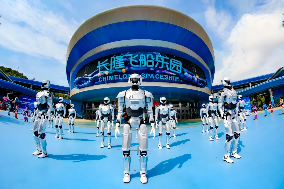 Standing aboard the aircraft, the robots performed synchronized gestures