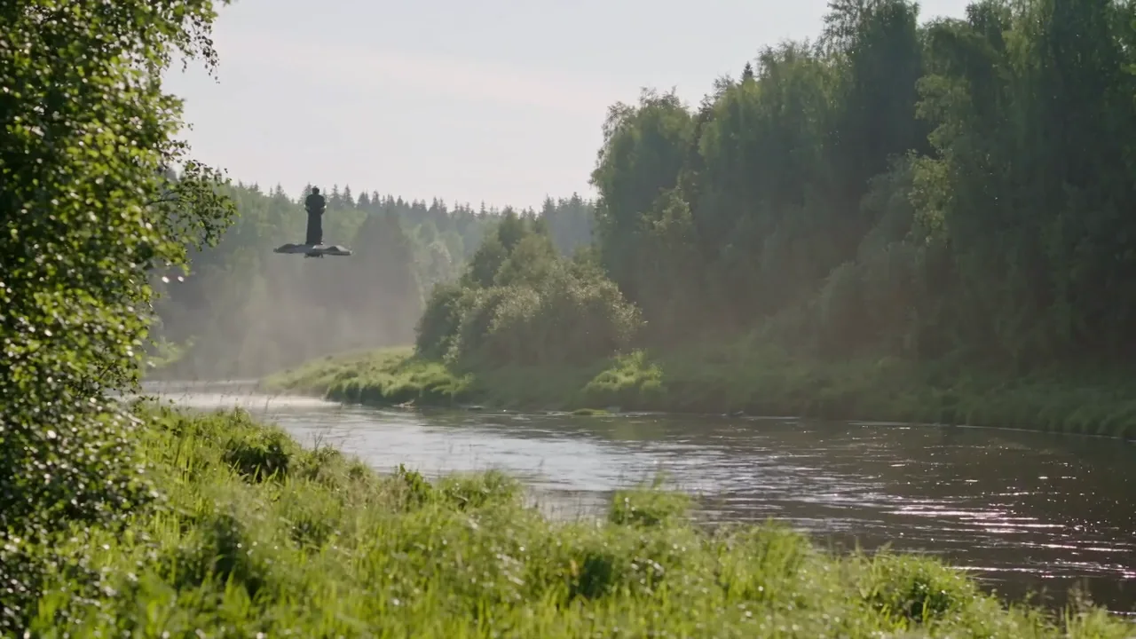 CoolFly URBAN flying above a forest river